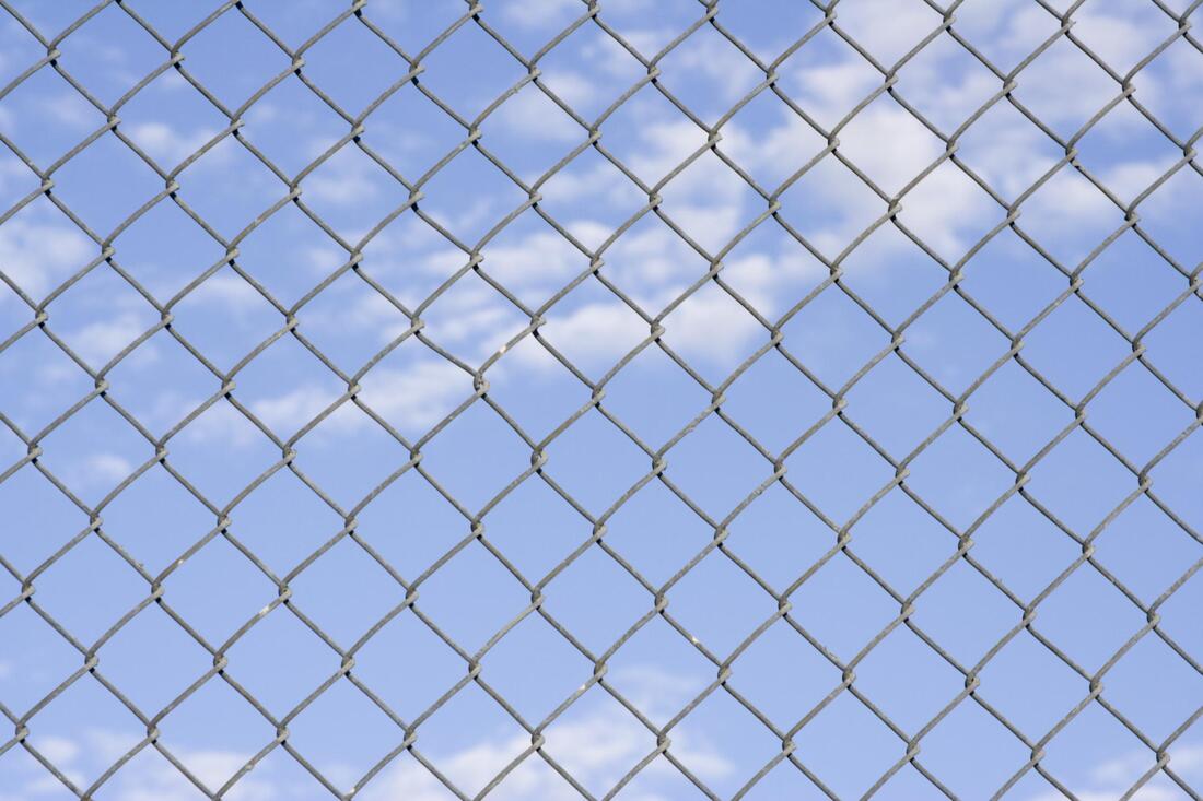 a gray chainlink fence