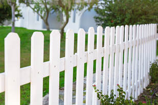 backyard with white vinyl fence