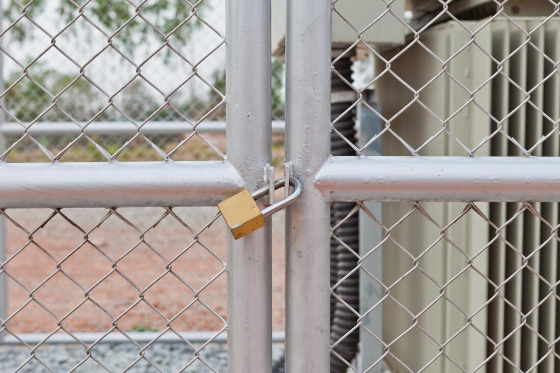 a commercial fence with lock